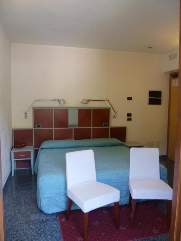 Postel nebo postele na pokoji v ubytování Hotel Derby