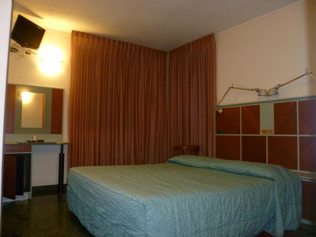 Postel nebo postele na pokoji v ubytování Hotel Derby