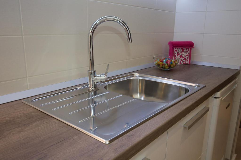 Kuchyň nebo kuchyňský kout v ubytování Paula Apartment
