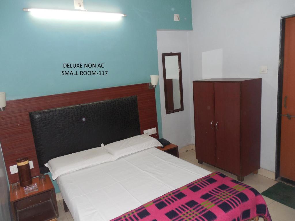 Postel nebo postele na pokoji v ubytování Hotel Silver Springs