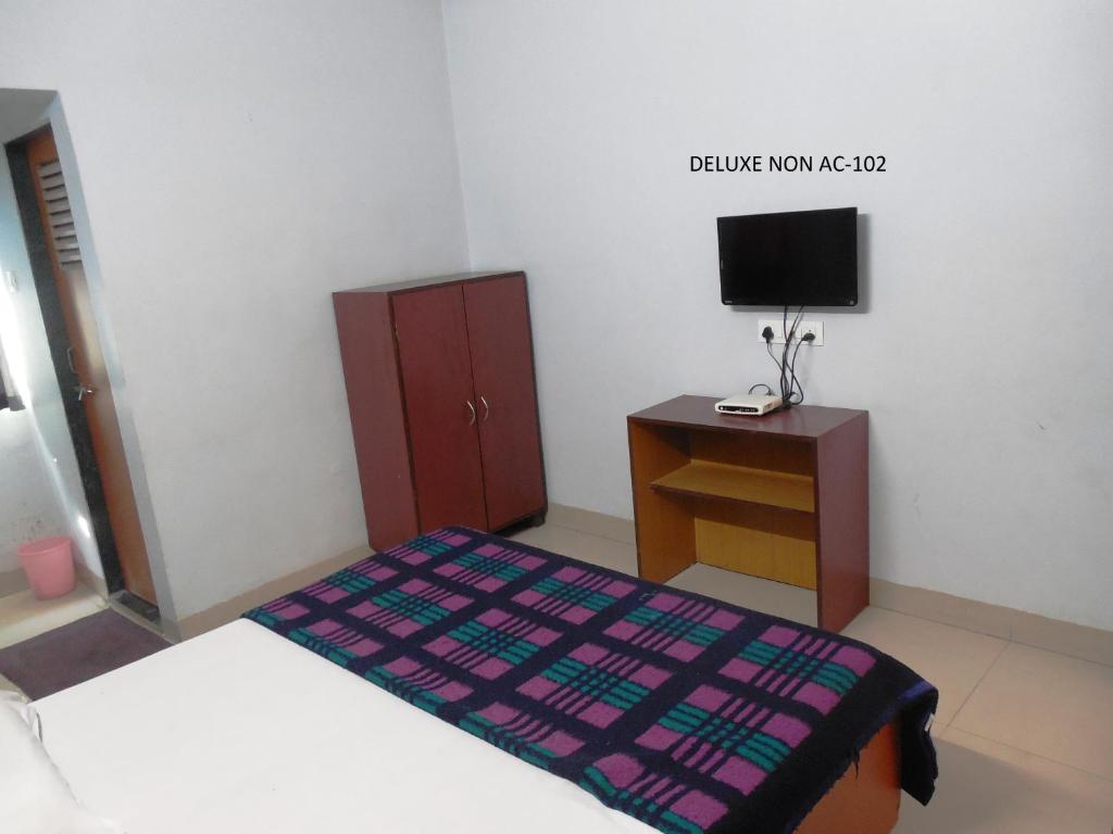 Postel nebo postele na pokoji v ubytování Hotel Silver Springs