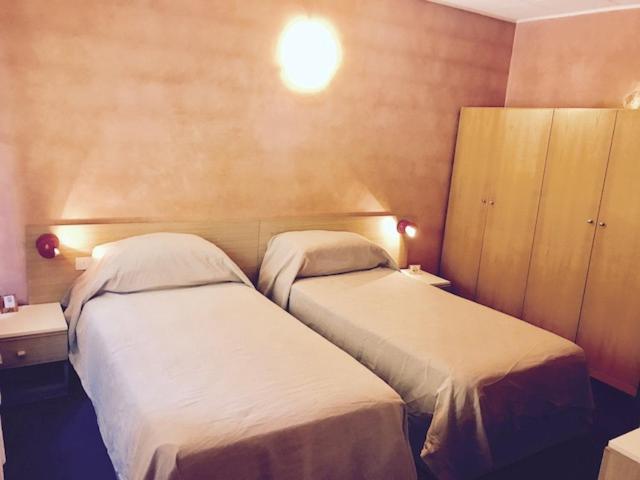 Postel nebo postele na pokoji v ubytování Hotel 2 Magnolie