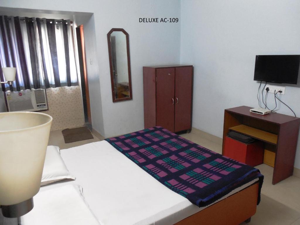 Postel nebo postele na pokoji v ubytování Hotel Silver Springs