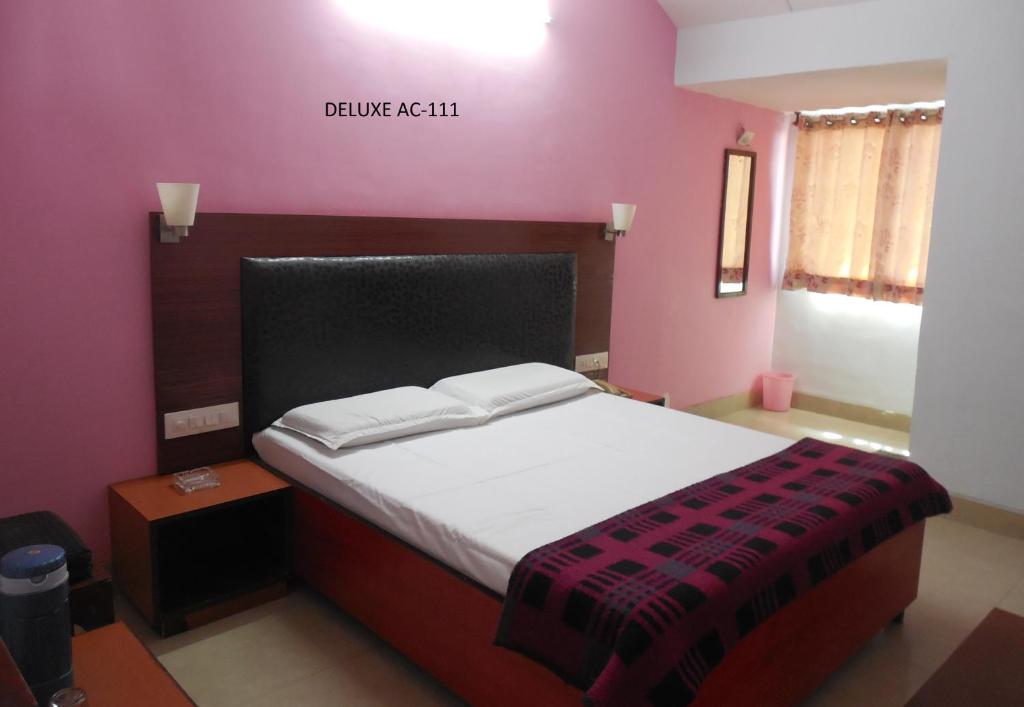 Postel nebo postele na pokoji v ubytování Hotel Silver Springs