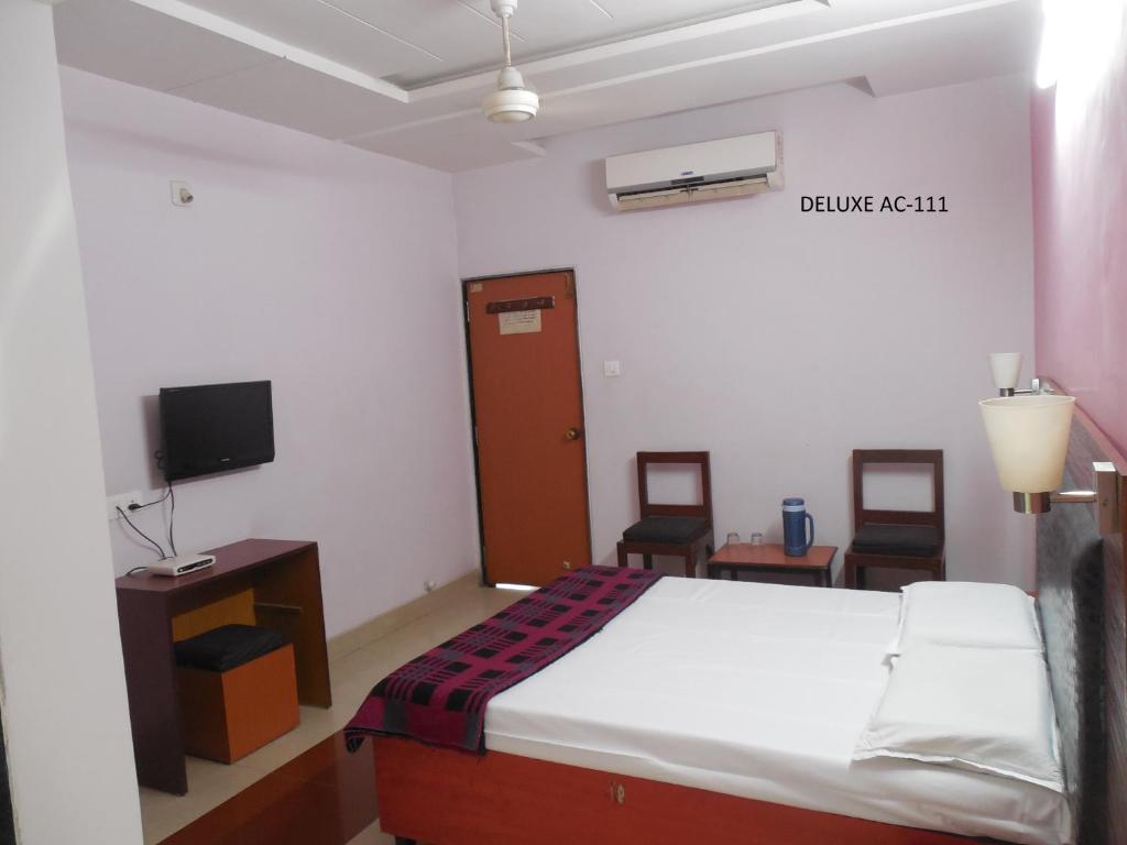 Postel nebo postele na pokoji v ubytování Hotel Silver Springs