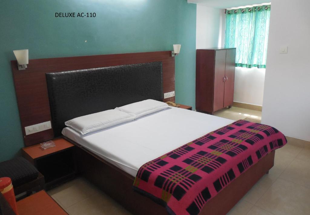 Postel nebo postele na pokoji v ubytování Hotel Silver Springs