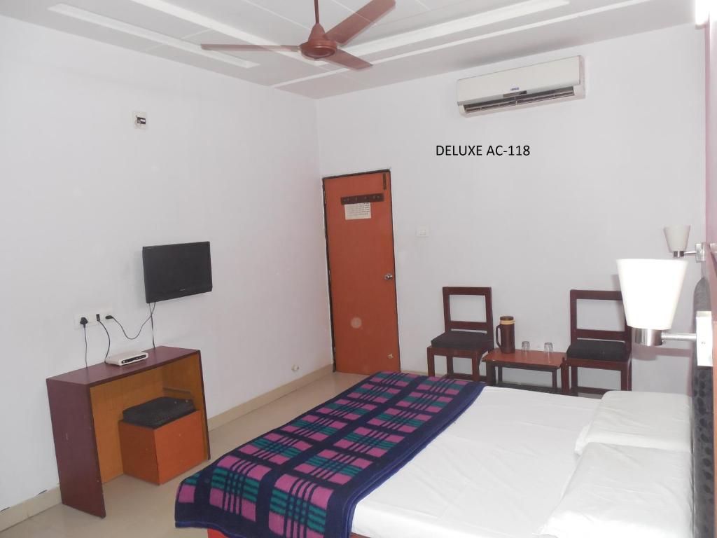 Postel nebo postele na pokoji v ubytování Hotel Silver Springs