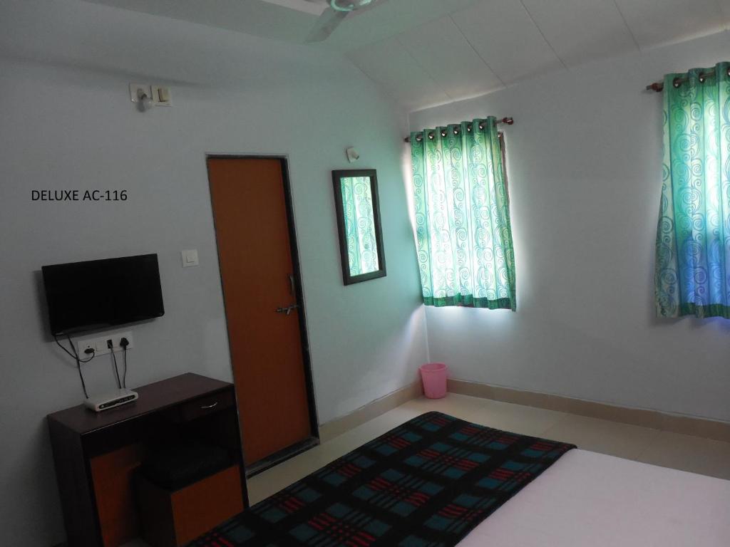 Postel nebo postele na pokoji v ubytování Hotel Silver Springs