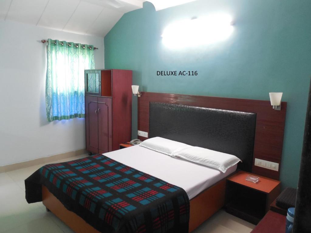 Postel nebo postele na pokoji v ubytování Hotel Silver Springs