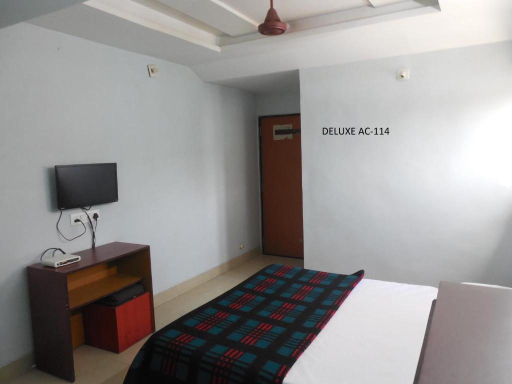 Postel nebo postele na pokoji v ubytování Hotel Silver Springs