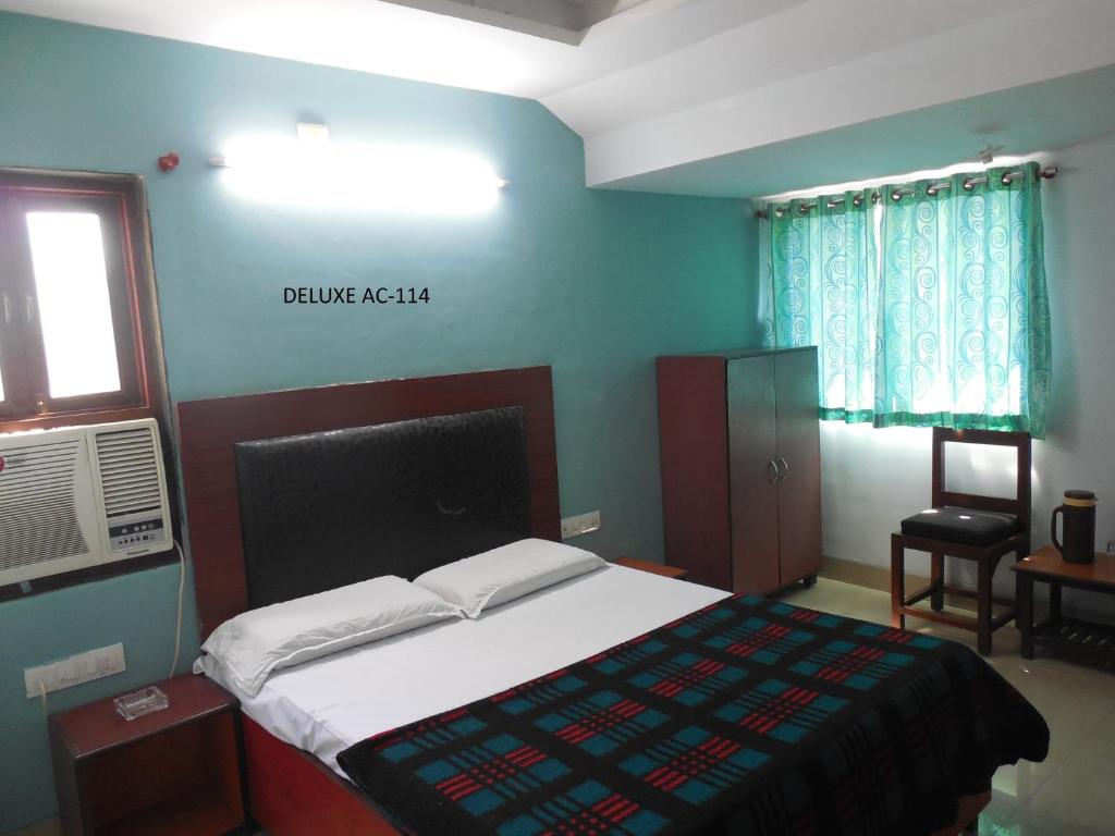 Postel nebo postele na pokoji v ubytování Hotel Silver Springs