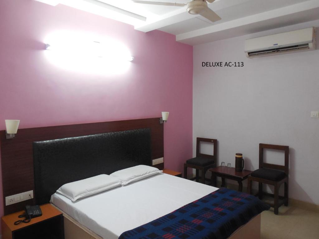Postel nebo postele na pokoji v ubytování Hotel Silver Springs