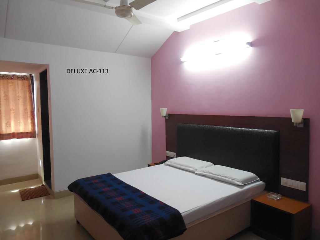 Postel nebo postele na pokoji v ubytování Hotel Silver Springs