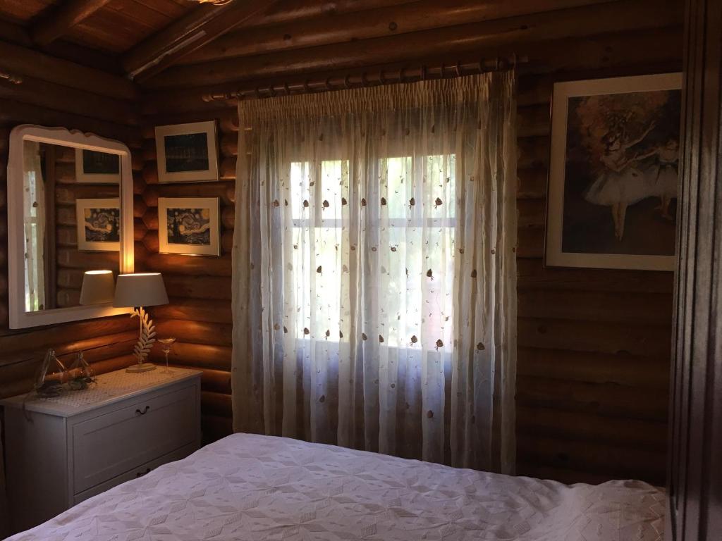 Postel nebo postele na pokoji v ubytování Anti Onirou