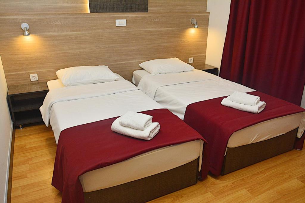 Postel nebo postele na pokoji v ubytování Hotel De KOKA