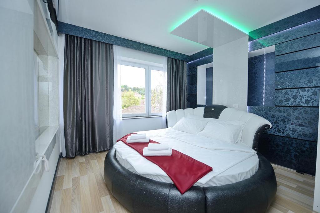 Postel nebo postele na pokoji v ubytování Hotel De KOKA