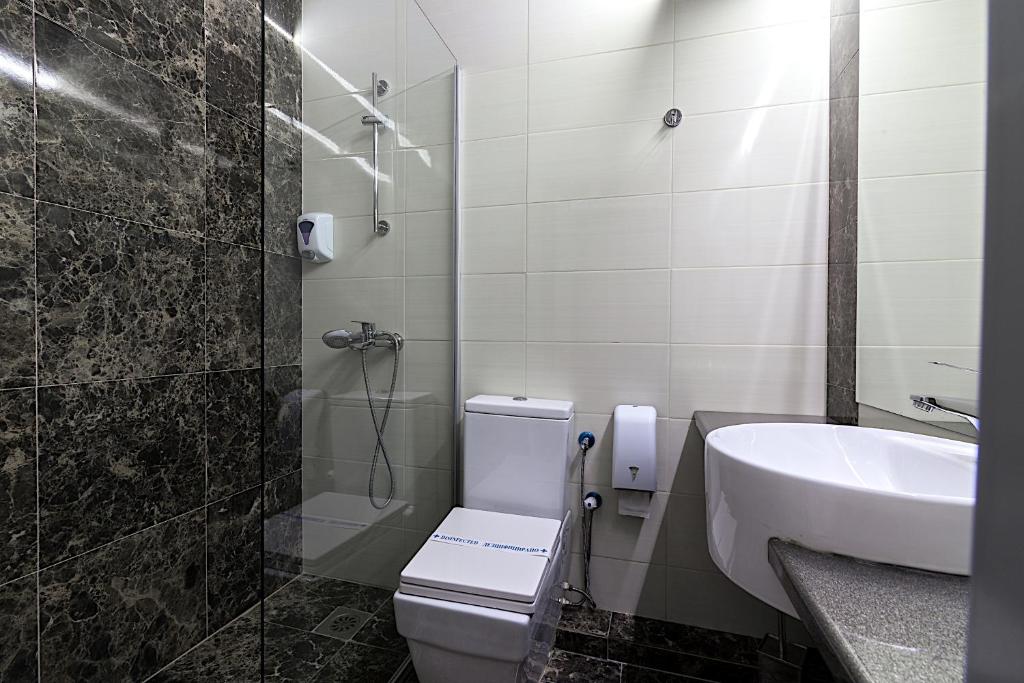 Koupelna v ubytování Hotel De KOKA