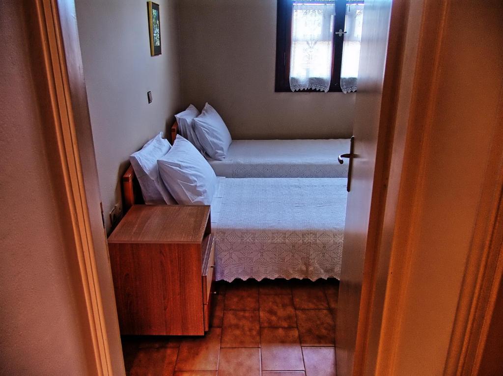 Postel nebo postele na pokoji v ubytování Casa Elaia