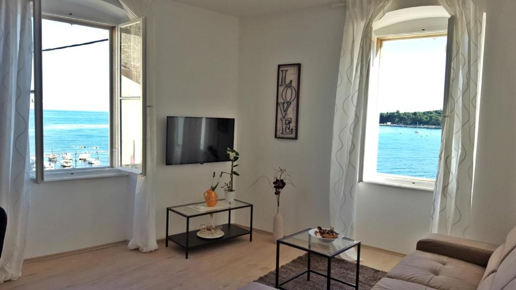 Telewizja i/lub zestaw kina domowego w obiekcie City Center Premium Apartment