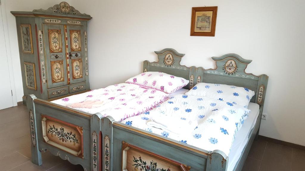 Кровать или кровати в номере Privatzimmer Jarosch