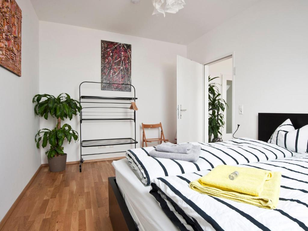 Posteľ alebo postele v izbe v ubytovaní City-Apartments Graz