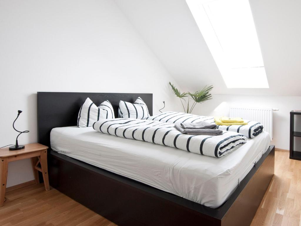Posteľ alebo postele v izbe v ubytovaní City-Apartments Graz