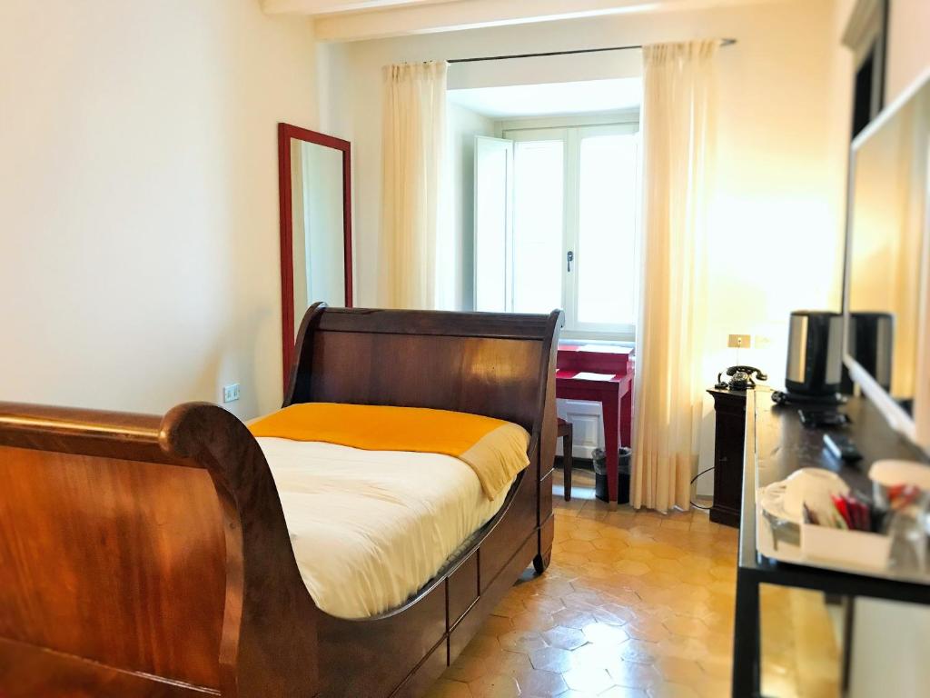 Postel nebo postele na pokoji v ubytování Relais & Chateaux Palazzo Seneca