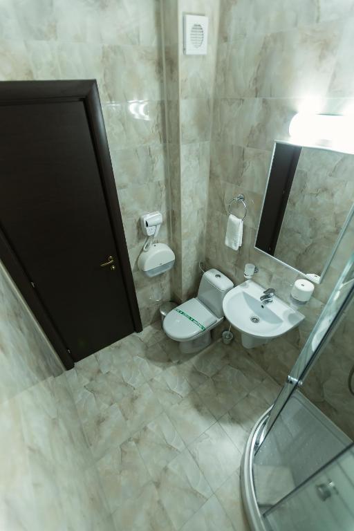 Koupelna v ubytování Express Residence