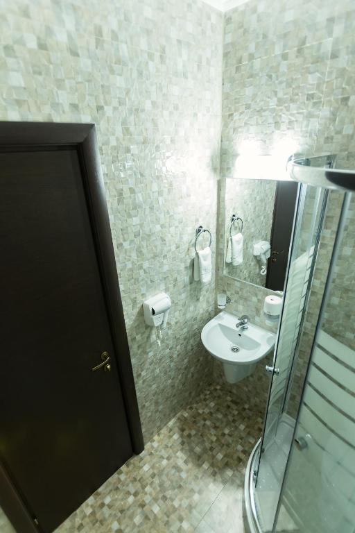 Koupelna v ubytování Express Residence
