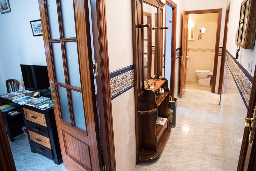 Televízia a/alebo spoločenská miestnosť v ubytovaní Apartamento Rincón del Salvador 2
