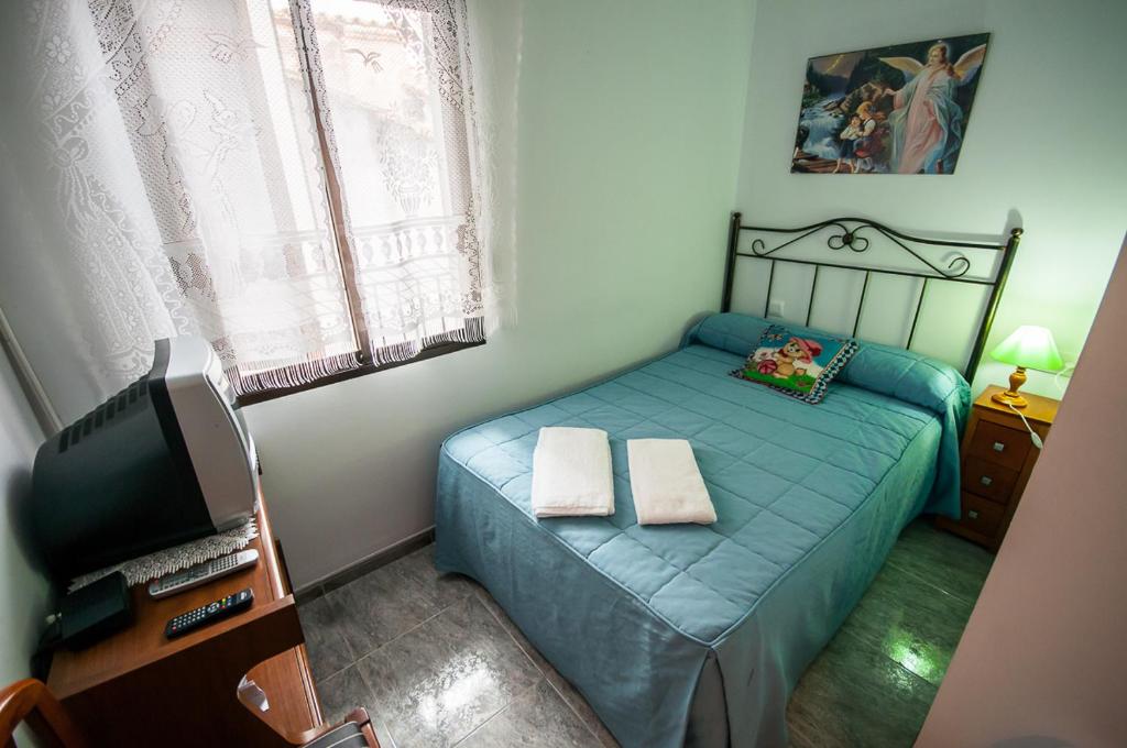 Posteľ alebo postele v izbe v ubytovaní Apartamento Rincón del Salvador 2