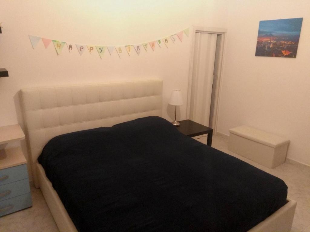 Postel nebo postele na pokoji v ubytování Tower Lecce