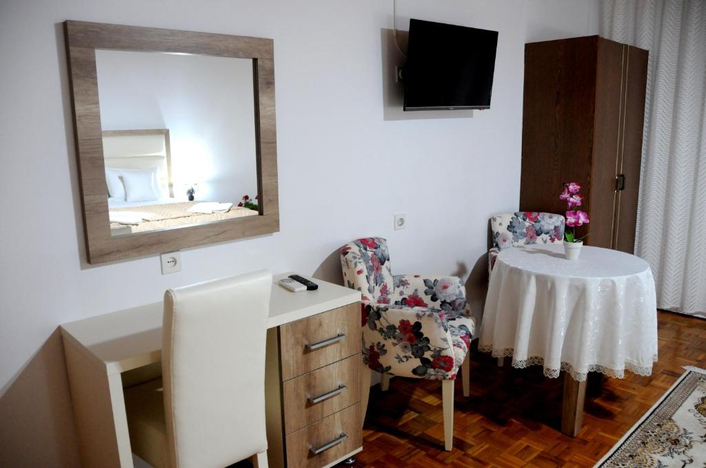 TV o dispositivi per l'intrattenimento presso Guest House Smajlaga