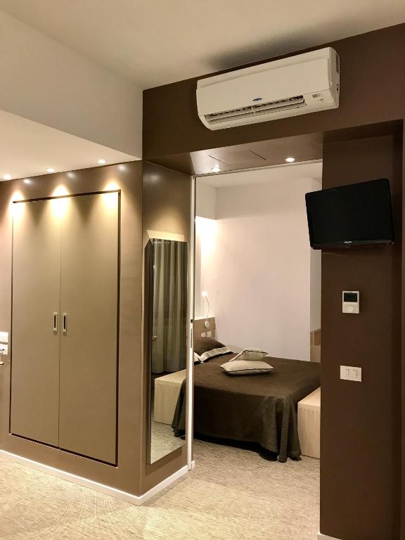 TV a/nebo společenská místnost v ubytování Hotel Palme