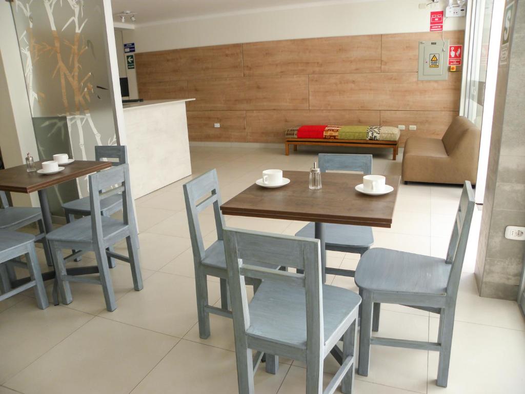 Kuchyň nebo kuchyňský kout v ubytování Nice Inn Tacna