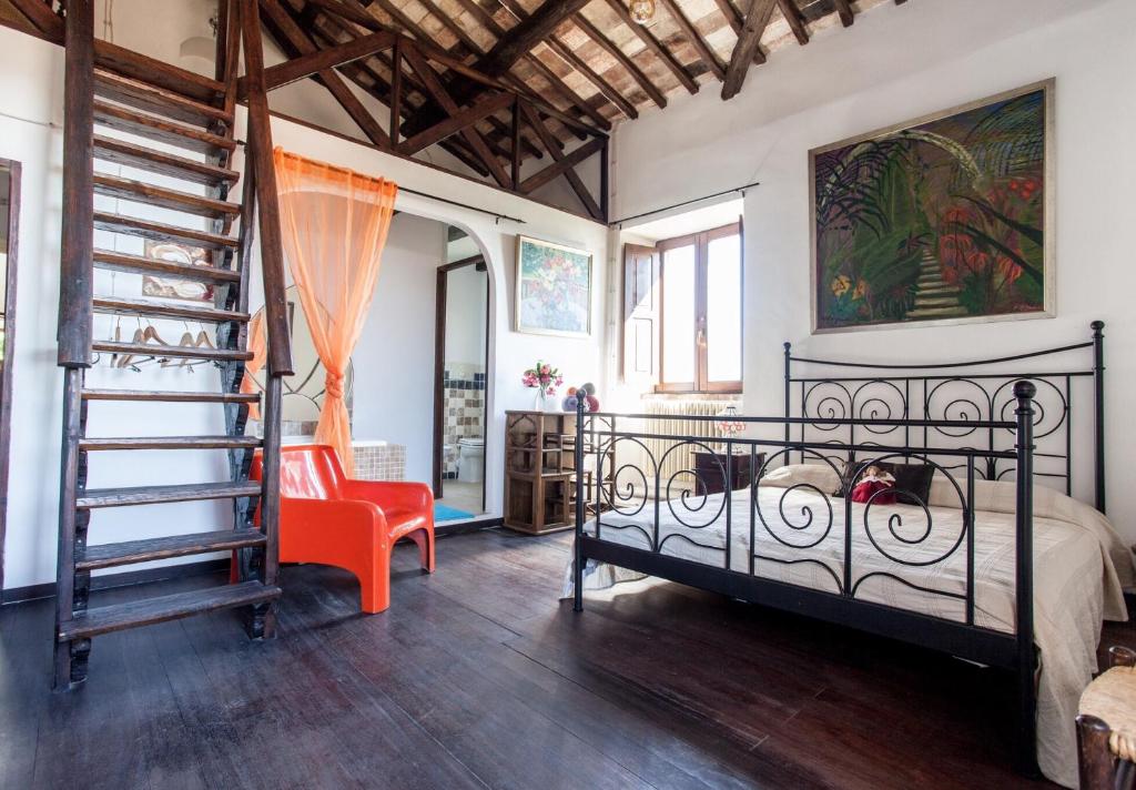 Кровать или кровати в номере Vinto House Civita