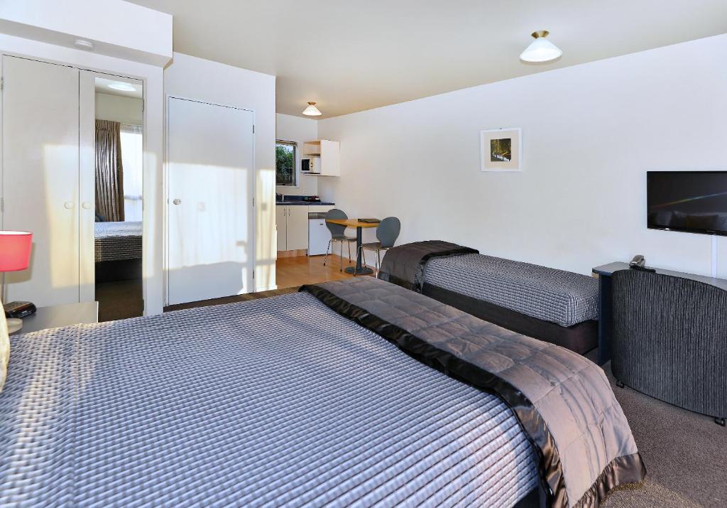 Postel nebo postele na pokoji v ubytování Arena Motel