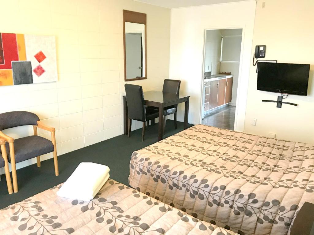 TV a/nebo společenská místnost v ubytování Greenview Motel