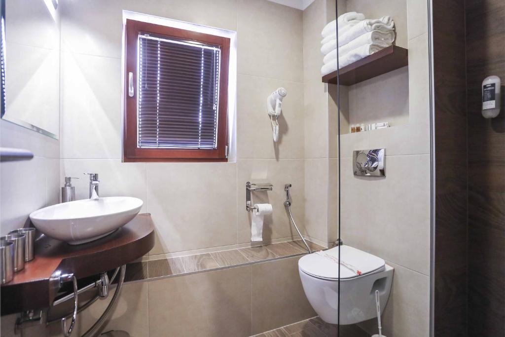 Koupelna v ubytování Hotel Noble