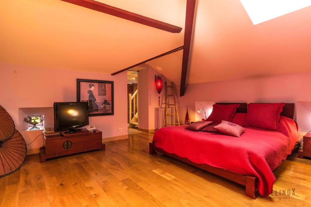 Postel nebo postele na pokoji v ubytování Manoir des Chanterelles
