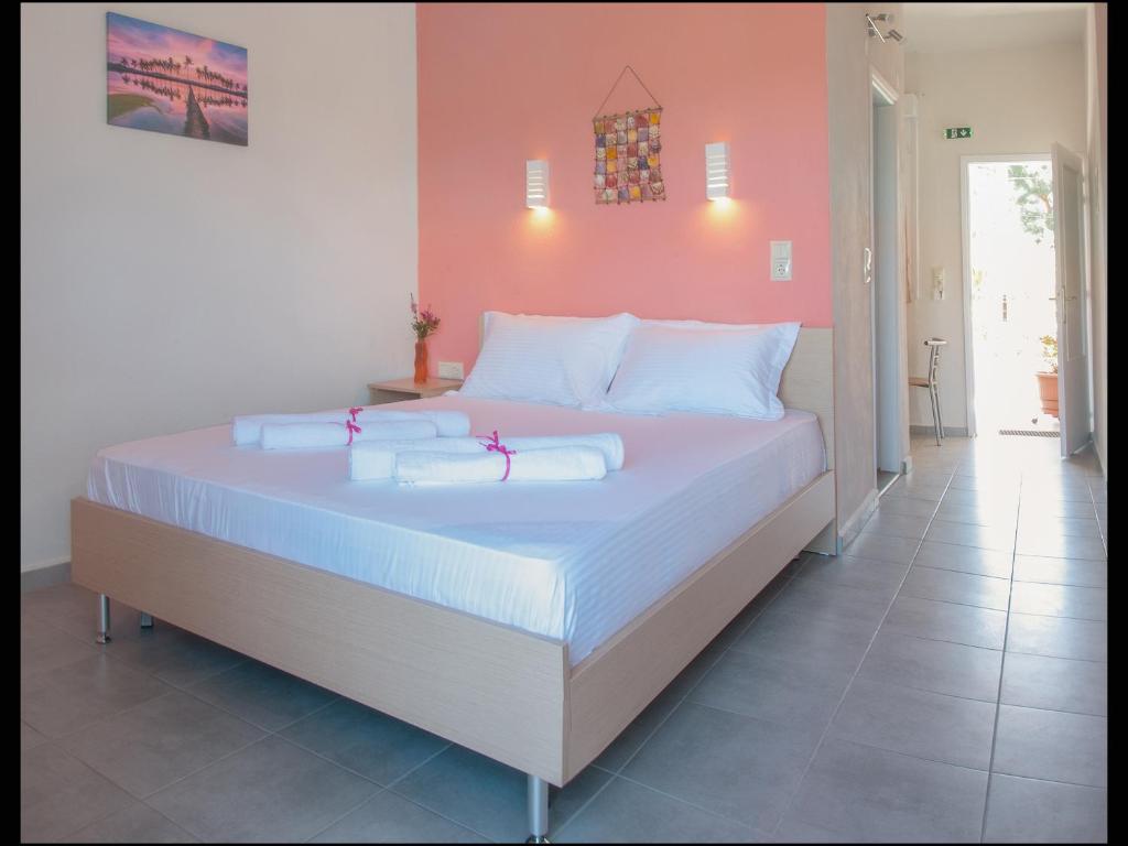 Postel nebo postele na pokoji v ubytování Sunray Apartments