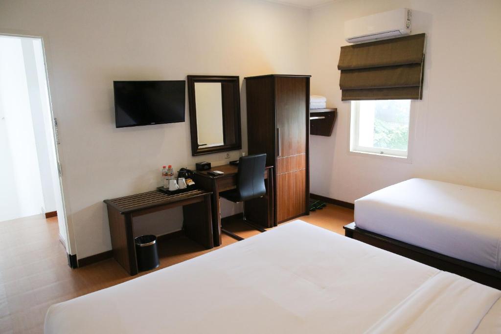 Postel nebo postele na pokoji v ubytování Samara Resort