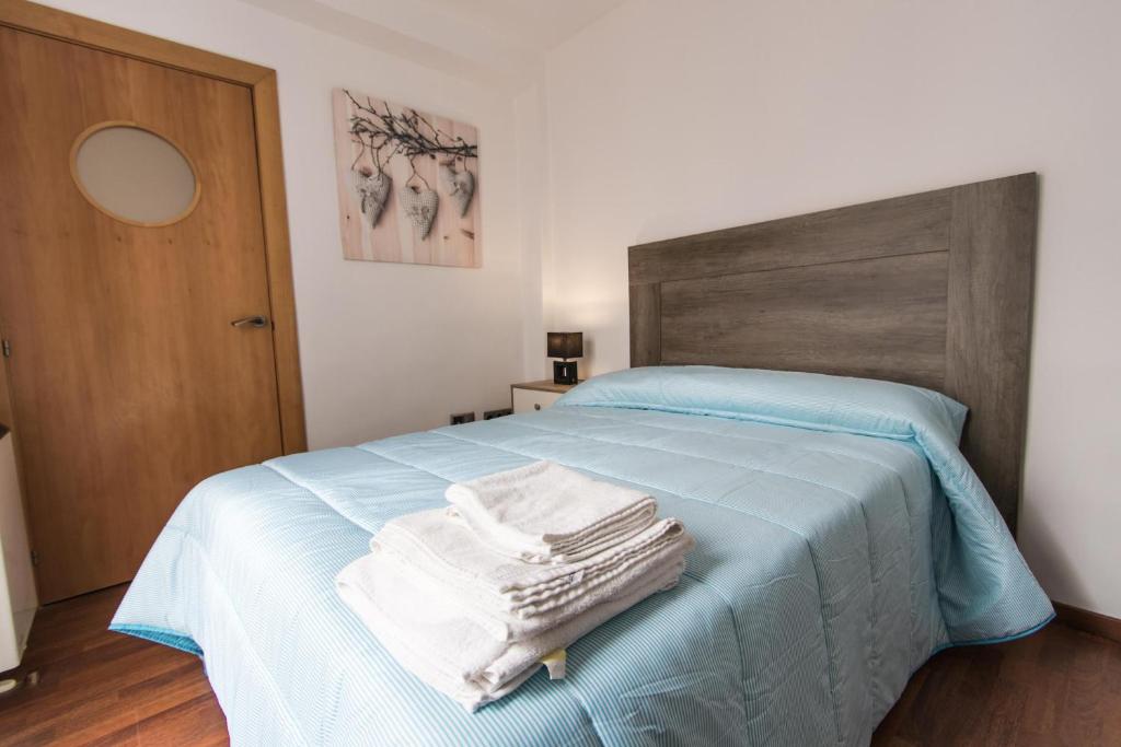 Posteľ alebo postele v izbe v ubytovaní Apartamento Completo Boquerón de Granada