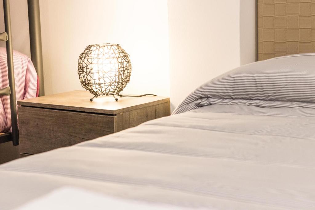 Posteľ alebo postele v izbe v ubytovaní Apartamento Completo Boquerón de Granada