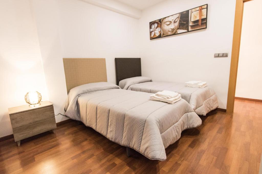 Posteľ alebo postele v izbe v ubytovaní Apartamento Completo Boquerón de Granada