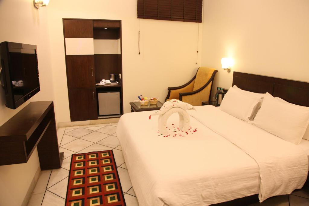 Postel nebo postele na pokoji v ubytování Hotel Taj Resorts