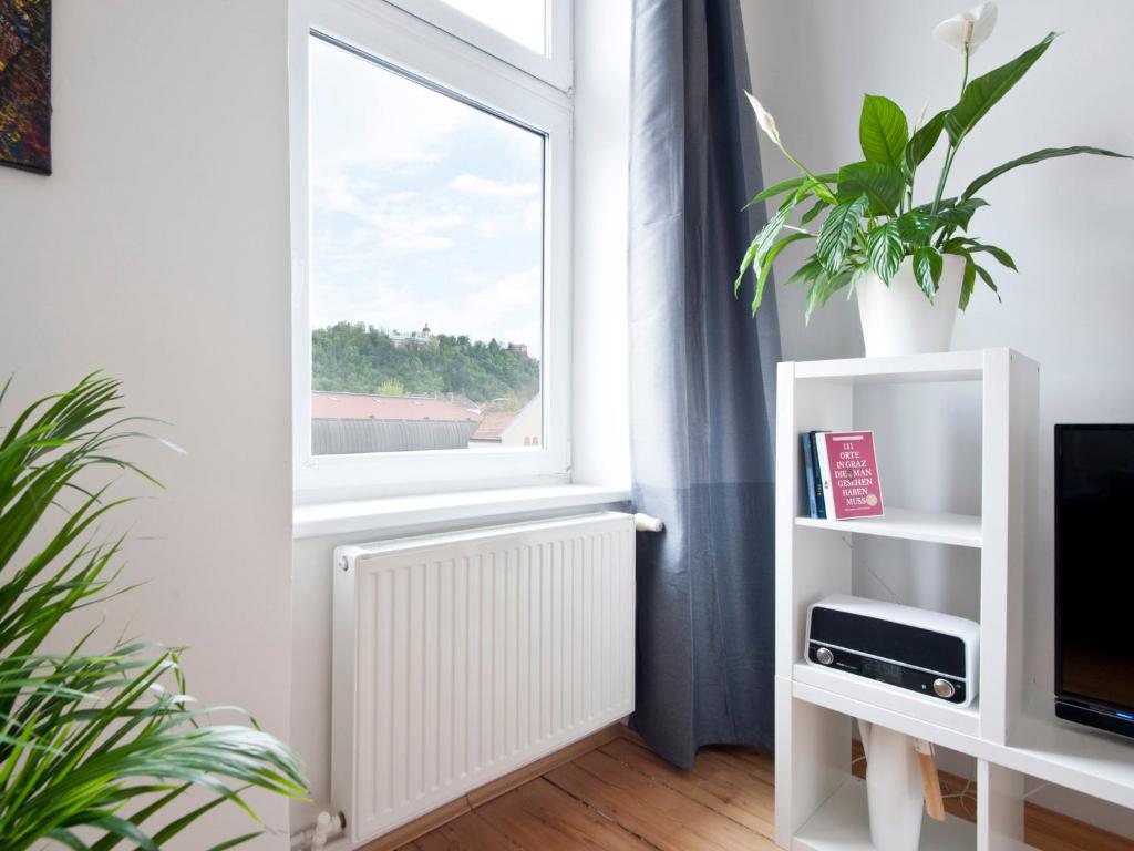 Televízia a/alebo spoločenská miestnosť v ubytovaní City-Apartments Graz