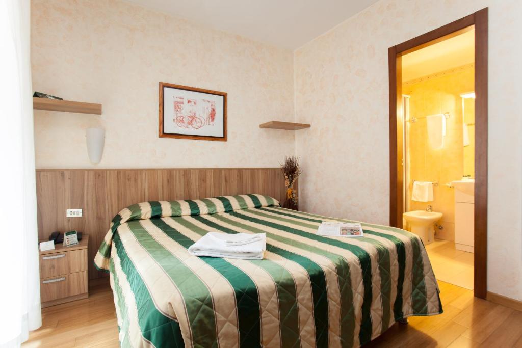 Letto o letti in una camera di Residence Desenzano