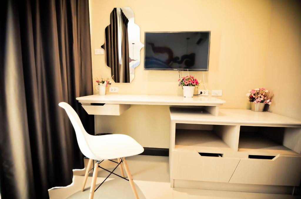 TV a/nebo společenská místnost v ubytování The Sila Hotel