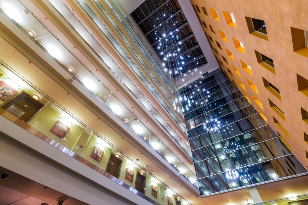 a view of a building with a escalator at Avalon Hotel & Conferences in Riga